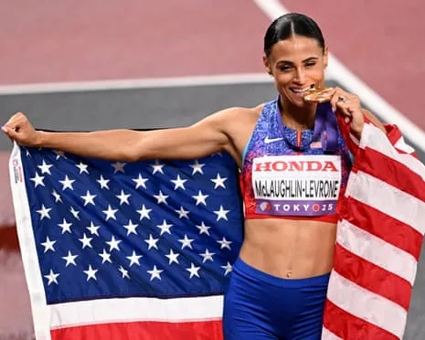 The American sprinter clocks speediest women’s 400m in 40 years to claim championship title
